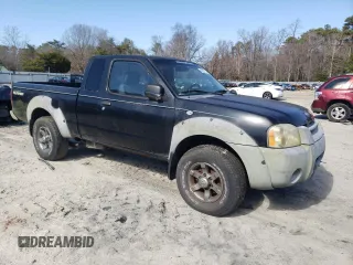 2001 Nissan Frontier SE Desert Runner with VIN 1N6ED26T41C403063, listed as a Copart auction lot 48227135 with 262,014 mi miles and Clean title. Bid and sale history available at DreamBid. Image 4.