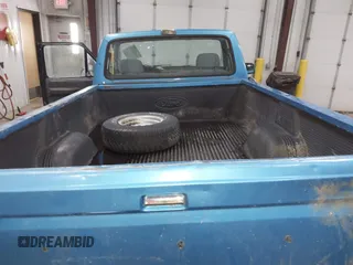 1992 Ford F-150 with VIN 1FTEF14H3NP809819, listed as a IAAI auction lot 41931404 with 2,135,096 mi miles. Bid and sale history available at carsss.com. Image 13.