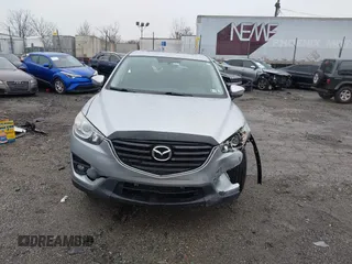2016 Mazda CX-5 Grand Touring with VIN JM3KE4DY4G0712465, listed as a IAAI auction lot 41859217 with 61,806 mi miles and . Bid and sale history available at carsss.com. Image 13.