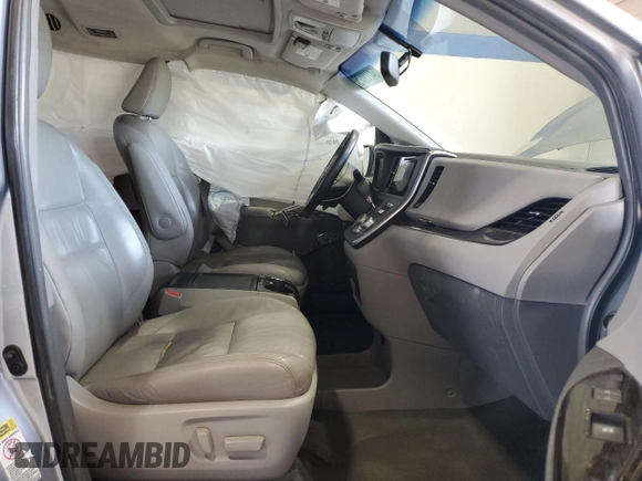 2015 Toyota Sienna XLE with VIN 5TDYK3DC9FS589378, listed as a Copart auction lot 54219075 with 117,766 mi miles and Salvage Title. Bid and sale history available at DreamBid. Image 7.