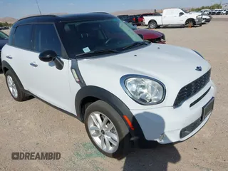 2014 MINI Countryman S z VIN WMWZC3C57EWP51864, wystawiony jako IAAI lot #42556774 z przebiegiem 73 912 mil mil oraz . Historia ofert i sprzedaży dostępna na DreamBid. Obrazek 1.
