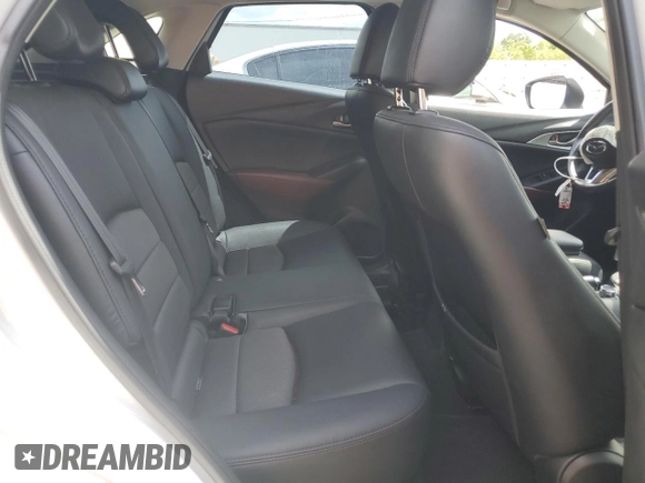 2017 Mazda CX-3 Touring z VIN JM1DKDC78H0150588, wystawiony jako Copart lot #55284205 z przebiegiem 78 923 mil mil oraz Szkoda całkowita • Salvage title. Historia ofert i sprzedaży dostępna na DreamBid. Obrazek 11.