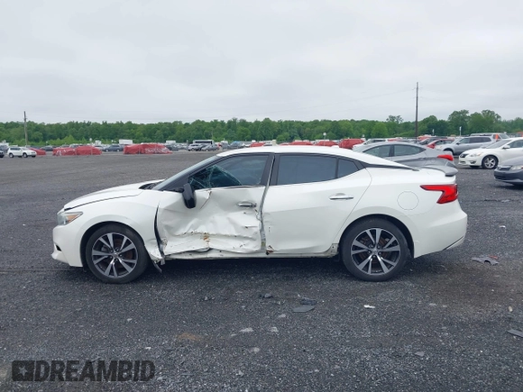 2016 Nissan Maxima SV z VIN 1N4AA6AP2GC375242, wystawiony jako IAAI lot #42220608 z przebiegiem 59 983 mil mil oraz . Historia ofert i sprzedaży dostępna na DreamBid. Obrazek 14.