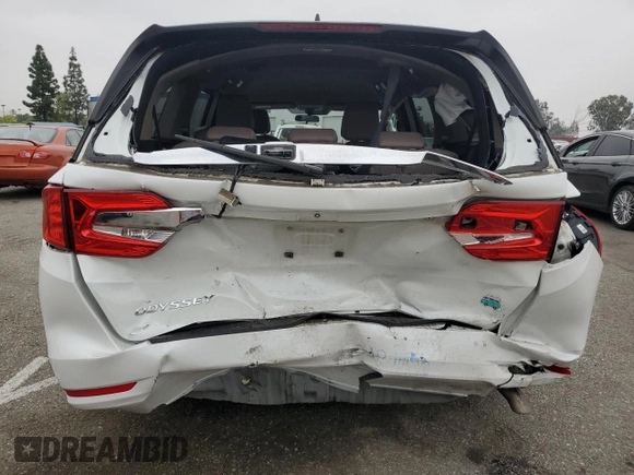 2020 Honda Odyssey EX with VIN 5FNRL6H57LB038073, listed as a Copart auction lot 54979525 with 38,114 mi miles and Salvage title. Bid and sale history available at DreamBid. Image 6.