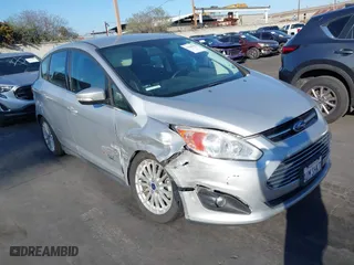 2016 Ford C-Max Energi SEL with VIN 1FADP5CU1GL101653, listed as a IAAI auction lot 41609592 with 96,010 mi miles. Bid and sale history available at carsss.com. Image 1.