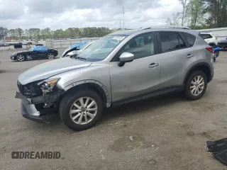 2014 Mazda CX-5 Touring with VIN JM3KE2CY8E0337229, listed as a Copart auction lot 50678125 with 84,216 mi miles and Salvage title. Bid and sale history available at DreamBid. Image 1.