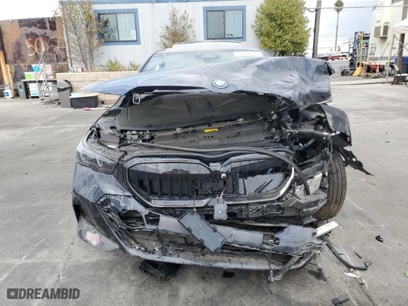 2024 BMW i5 eDrive40 with VIN WBY33FK03RCR93119, listed as a Copart auction lot 76124194 with 0 mi miles and Salvage Title. Bid and sale history available at carsss.com. Image 5.