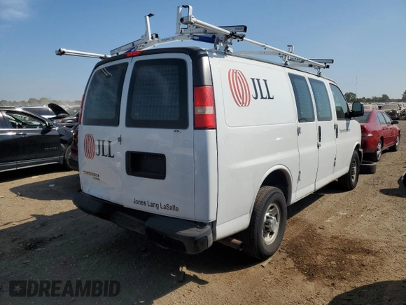 2014 Chevrolet Express Cargo Van with VIN 1GCWGFCA4E1122858, listed as a Copart auction lot 72409114 with 137,908 mi miles and Salvage Title. Bid and sale history available at carsss.com. Image 3.