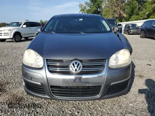 2010 Volkswagen Jetta Limited Edition с VIN 3VWAX7AJ9AM143766, выставлен на аукционе Copart как лот 58449675 с пробегом 256 033 миль миль и Списание • Salvage title. История ставок и продаж доступна на DreamBid. Изображение 5.