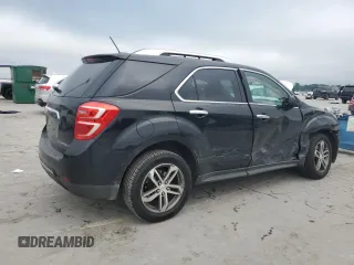2016 Chevrolet Equinox LTZ z VIN 2GNALDEKXG6332081, wystawiony jako Copart lot #56972925 z przebiegiem 97 460 mil mil oraz Szkoda całkowita • Salvage title. Historia ofert i sprzedaży dostępna na DreamBid. Obrazek 3.