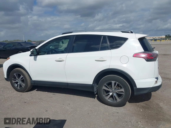 2018 Toyota RAV4 XLE with VIN JTMWFREV7JJ731893, listed as a IAAI auction lot 41567850 with 141,269 mi miles. Bid and sale history available at carsss.com. Image 14.