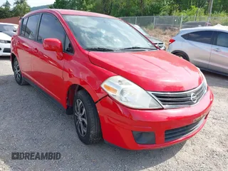 2012 Nissan Versa S with VIN 3N1BC1CPXCL360370, listed as a IAAI auction lot 42178631 with 160,556 mi miles. Bid and sale history available at carsss.com. Image 6.
