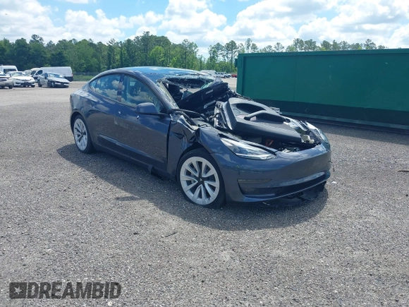 2022 Tesla Model 3 Long Range z VIN 5YJ3E1EB0NF124664, wystawiony jako IAAI lot #34246337 z przebiegiem Nie podano mil oraz . Historia ofert i sprzedaży dostępna na DreamBid. Obrazek 1.