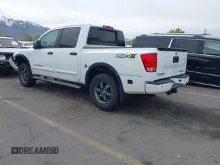 2014 Nissan Titan Pro-4X with VIN 1N6BA0ECXEN501915, listed as a IAAI auction lot 42097967 with 120,851 mi miles and . Bid and sale history available at DreamBid. Image 3.