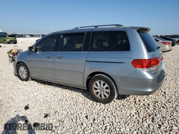2009 Honda Odyssey EX-L with VIN 5FNRL38799B034292, listed as a Copart auction lot 52547205 with 116,658 mi miles and Salvage Title. Bid and sale history available at DreamBid. Image 2.