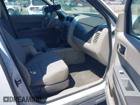 2012 Ford Escape XLT with VIN 1FMCU9DG9CKA09099, listed as a IAAI auction lot 40371699 with 136,707 mi miles and . Bid and sale history available at DreamBid. Image 5.