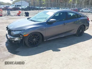 2020 Honda Civic Si z VIN 2HGFC1E53LH704576, wystawiony jako IAAI lot #41979301 z przebiegiem 59 245 mil mil oraz . Historia ofert i sprzedaży dostępna na DreamBid. Obrazek 2.