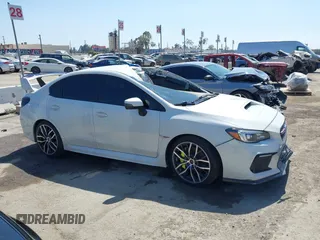 2019 Subaru WRX STI z VIN JF1VA2R6XK9814201, wystawiony jako IAAI lot #41641582 z przebiegiem 57 327 mil mil oraz . Historia ofert i sprzedaży dostępna na DreamBid. Obrazek 13.