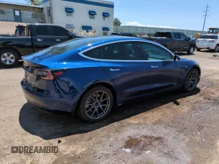 2018 Tesla Model 3 Long Range Battery z VIN 5YJ3E1EBXJF146469, wystawiony jako Copart lot #60101515 z przebiegiem 131 507 mil mil oraz Czysty tytuł • Clean title. Historia ofert i sprzedaży dostępna na DreamBid. Obrazek 3.