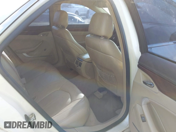 2009 Cadillac CTS AWD z VIN 1G6DT57VX90140080, wystawiony jako IAAI lot #41802817 z przebiegiem 146 978 mil mil oraz . Historia ofert i sprzedaży dostępna na DreamBid. Obrazek 8.