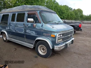 1995 Chevrolet Chevy Van z VIN 1GBEG25K2SF232174, wystawiony jako IAAI lot #42247426 z przebiegiem 130 910 mil mil oraz . Historia ofert i sprzedaży dostępna na DreamBid. Obrazek 1.