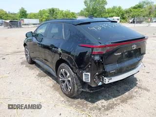 2024 Toyota bZ4X XLE with VIN JTMABACA7RA061457, listed as a IAAI auction lot 42395872 with 16,558 mi miles and . Bid and sale history available at DreamBid. Image 3.
