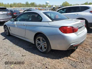 2014 BMW 4 Series 428i xDrive with VIN WBA3T1C58EP819710, listed as a Copart auction lot 54699235 with 196,856 mi miles and Salvage Title. Bid and sale history available at carsss.com. Image 2.