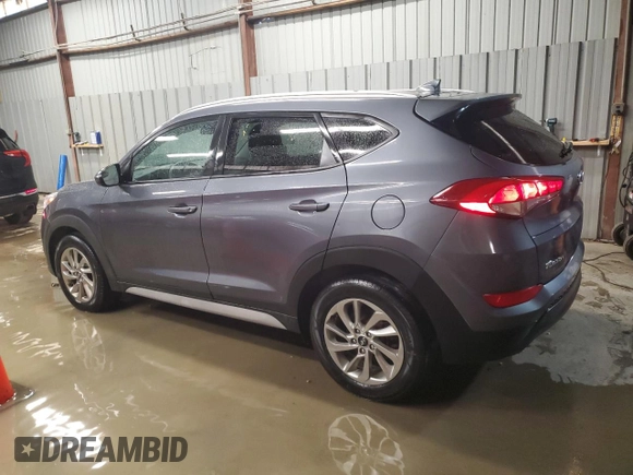 2018 Hyundai Tucson SEL with VIN KM8J3CA46JU734310, listed as a Copart auction lot 57978435 with 128,379 mi miles and Clean title. Bid and sale history available at DreamBid. Image 2.
