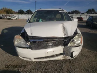2011 Kia Sedona LX with VIN KNDMG4C74B6370803, listed as a Copart auction lot 77228344 with 142,394 mi miles and Salvage Title. Bid and sale history available at carsss.com. Image 5.