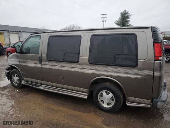 2002 Chevrolet Express Van with VIN 1GBFG15R221233379, listed as a Copart auction lot 80427284 with 131,000 mi miles and Salvage Title. Bid and sale history available at carsss.com. Image 2.