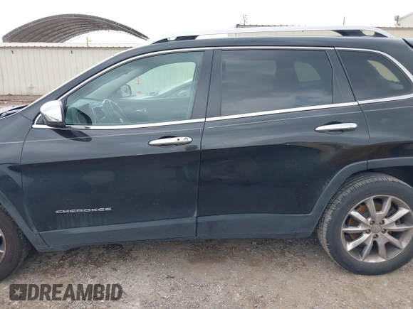 2014 Jeep Cherokee Limited with VIN 1C4PJLDS8EW104085, listed as a IAAI auction lot 42104059 with 141,951 mi miles and . Bid and sale history available at DreamBid. Image 14.