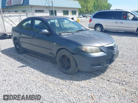 2009 Mazda 3 i Touring Value with VIN JM1BK32F291249221, listed as a IAAI auction lot 42006435 with 249,775 mi miles. Bid and sale history available at carsss.com. Image 1.