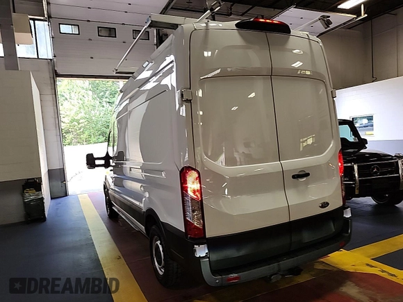 2023 Ford Transit Cargo z VIN 1FTBR1X85PKC00581, wystawiony jako IAAI lot #42900680 z przebiegiem 8 386 mil mil oraz . Historia ofert i sprzedaży dostępna na DreamBid. Obrazek 5.