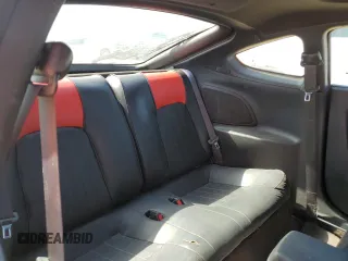 2003 Hyundai Tiburon GT z VIN KMHHN65F53U041351, wystawiony jako Copart lot #52332395 z przebiegiem 194 821 mil mil oraz Czysty tytuł • Clean title. Historia ofert i sprzedaży dostępna na DreamBid. Obrazek 10.
