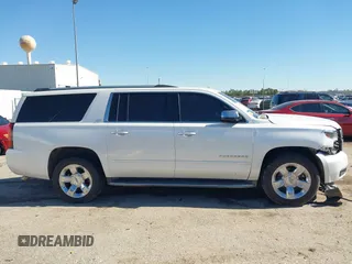 2016 Chevrolet Suburban LTZ with VIN 1GNSCJKC0GR135103, listed as a IAAI auction lot 41372158 with 167,540 mi miles and . Bid and sale history available at DreamBid. Image 13.