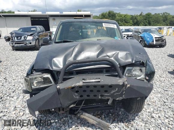 2002 Ford Ranger XLT Appearance with VIN 1FTYR44E42TA32828, listed as a Copart auction lot 60205715 with 290,846 mi miles and Salvage title. Bid and sale history available at DreamBid. Image 5.