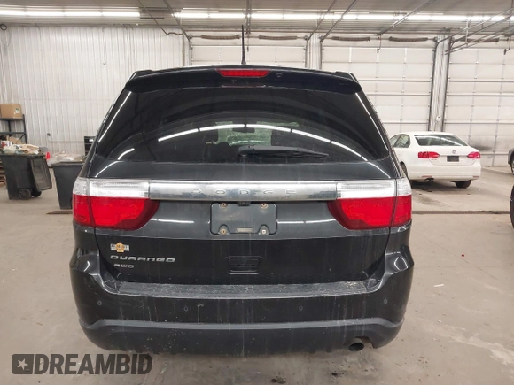 2013 Dodge Durango SXT with VIN 1C4RDJAG0DC512293, listed as a IAAI auction lot 41875919 with 191,128 mi miles and . Bid and sale history available at DreamBid. Image 17.