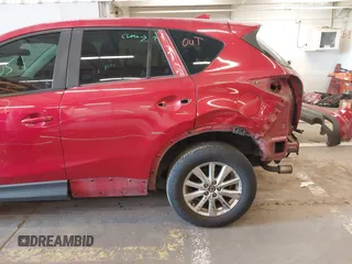 2016 Mazda CX-5 Sport z VIN JM3KE2BY3G0684861, wystawiony jako IAAI lot #42050897 z przebiegiem 165 688 mil mil oraz . Historia ofert i sprzedaży dostępna na DreamBid. Obrazek 6.