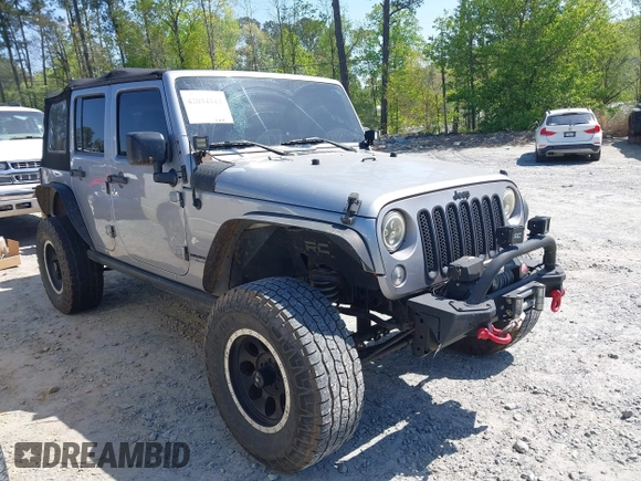 2014 Jeep Wrangler Unlimited Sport with VIN 1C4BJWDG4EL292421, listed as a IAAI auction lot 42034343 with 157,820 mi miles. Bid and sale history available at carsss.com. Image 1.