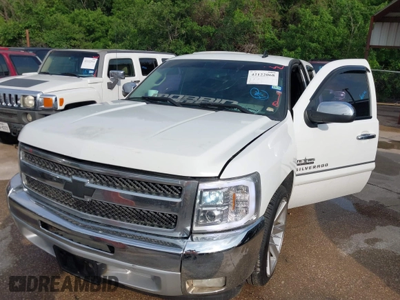 2013 Chevrolet Silverado 1500 LT with VIN 1GCRCSE05DZ366248, listed as a IAAI auction lot 42122068 with 233,316 mi miles and . Bid and sale history available at DreamBid. Image 6.