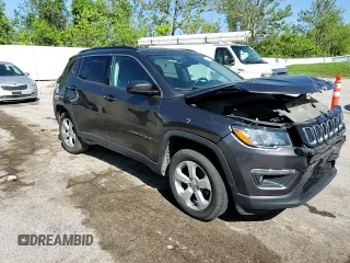 2018 Jeep Compass Latitude z VIN 3C4NJDBB3JT142940, wystawiony jako Copart lot #56306475 z przebiegiem 75 387 mil mil oraz Szkoda całkowita • Salvage title. Historia ofert i sprzedaży dostępna na DreamBid. Obrazek 14.