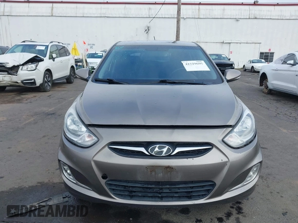 2013 Hyundai Accent SE z VIN KMHCU5AE1DU079830, wystawiony jako IAAI lot #41529695 z przebiegiem 105 637 mil mil oraz . Historia ofert i sprzedaży dostępna na DreamBid. Obrazek 12.