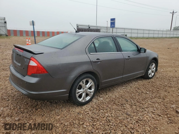 2012 Ford Fusion SE with VIN 3FAHP0HA7CR317179, listed as a Copart auction lot 60606575 with 148,766 mi miles and Clean title. Bid and sale history available at DreamBid. Image 3.