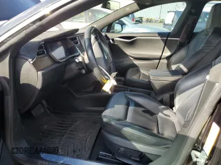 2016 Tesla Model S 90D with VIN 5YJSA1E2XGF150490, listed as a Copart auction lot 51070365 with 144,457 mi miles and Salvage Title. Bid and sale history available at DreamBid. Image 7.