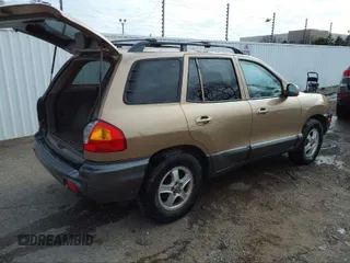 2004 Hyundai Santa Fe GLS with VIN KM8SC13D34U781837, listed as a IAAI auction lot 40452732 with 223,991 mi miles. Bid and sale history available at carsss.com. Image 4.