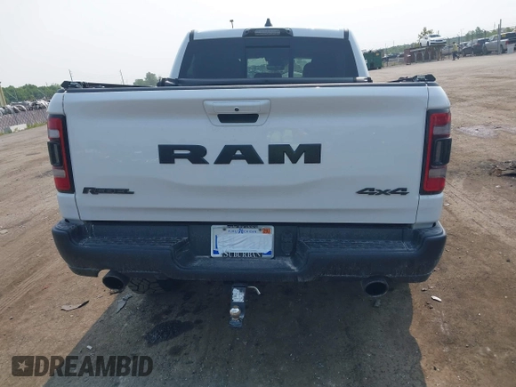 2022 Ram 1500 Rebel with VIN 1C6SRFLT5NN318494, listed as a IAAI auction lot 42413194 with 59,458 mi miles and . Bid and sale history available at DreamBid. Image 16.