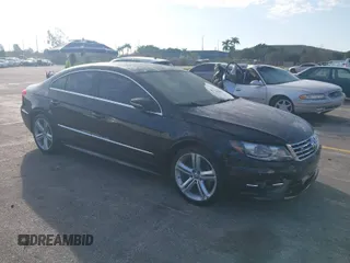 2016 Volkswagen CC Sport with VIN WVWBP7AN8GE502338, listed as a IAAI auction lot 41535048 with 71,645 mi miles. Bid and sale history available at carsss.com. Image 1.