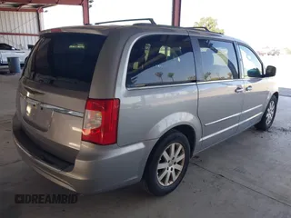 2013 Chrysler Town & Country Touring with VIN 2C4RC1BG6DR721126, listed as a IAAI auction lot 42225899 with 112,853 mi miles and . Bid and sale history available at DreamBid. Image 4.