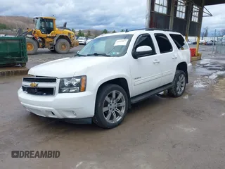 2013 Chevrolet Tahoe LT with VIN 1GNSKBE05DR293054, listed as a IAAI auction lot 41955877 with 192,474 mi miles and . Bid and sale history available at DreamBid. Image 18.
