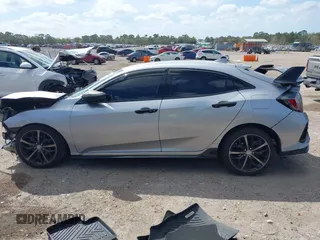 2021 Honda Civic Sport with VIN SHHFK7H43MU225961, listed as a IAAI auction lot 41721936 with 58,928 mi miles and . Bid and sale history available at DreamBid. Image 14.